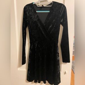 Small Forever 21 v neck dress with long sleeves and crushed velvet fabric.